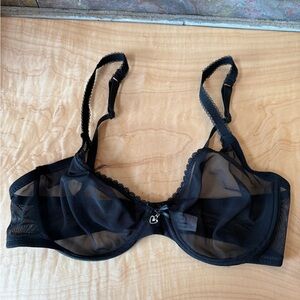 NWOT unbranded black see thru bra, 36D. 
Underwire, adjustable straps, stretch